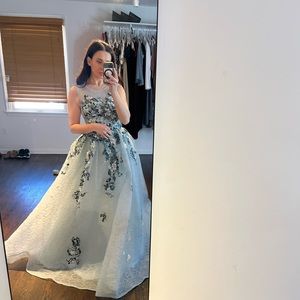 This is a stunning embroidered gown by Andrea and Leo.